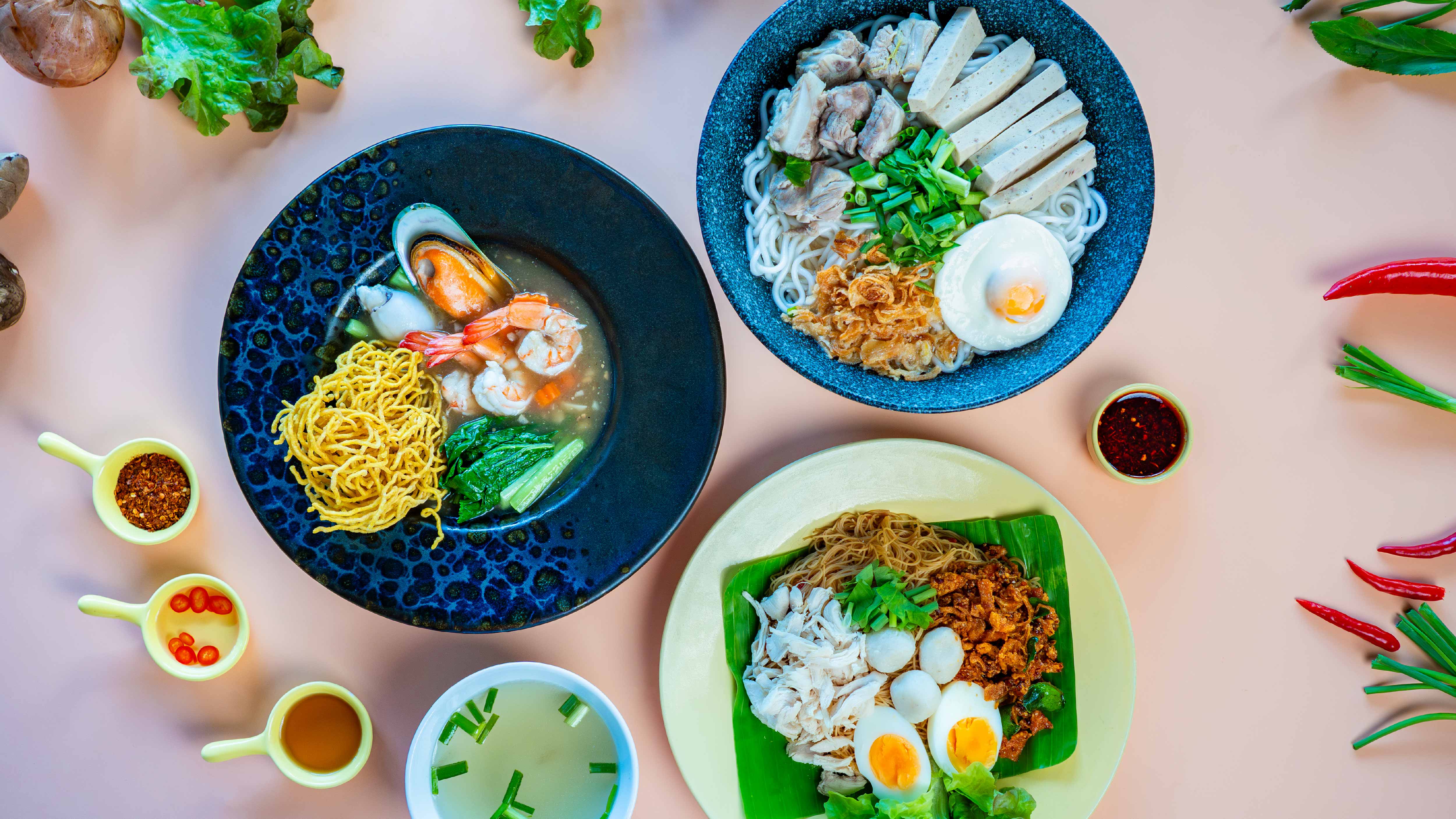 Savor three irresistible noodle bowls—rich, comforting, and full of bold flavors in every bite, made for noodle lovers: Guay Jab Yuan, Rad Nar Mee Krob Talay, and Sen Mee Gai Cheek.